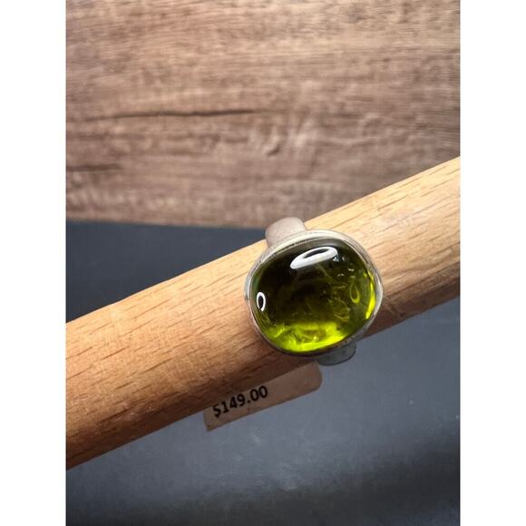 SOLD 

NEW size 7 oval peridot sterling silver ring 6.20 grams - Picture 9 of 15